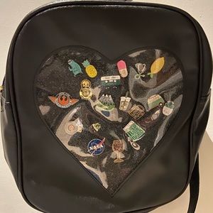 Mini vegan leather backpack, black, with pin display. *pins not included.